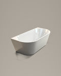 ALCOVE vessel, an oval with one straight side, in white acrylic, three-quarter view, on a warm grey studio background