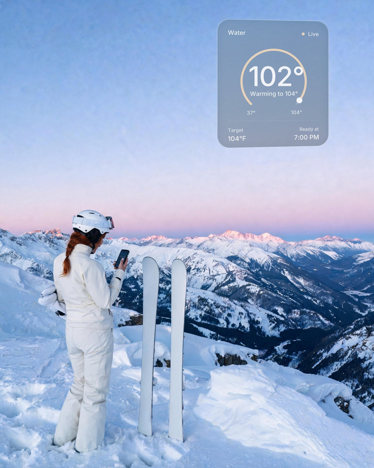 A skier at a Rocky Mountain summit at alpenglow warms her hot and cold vessel at home from her phone: 102°F, warming to 104°F, ready at 7:00 PM