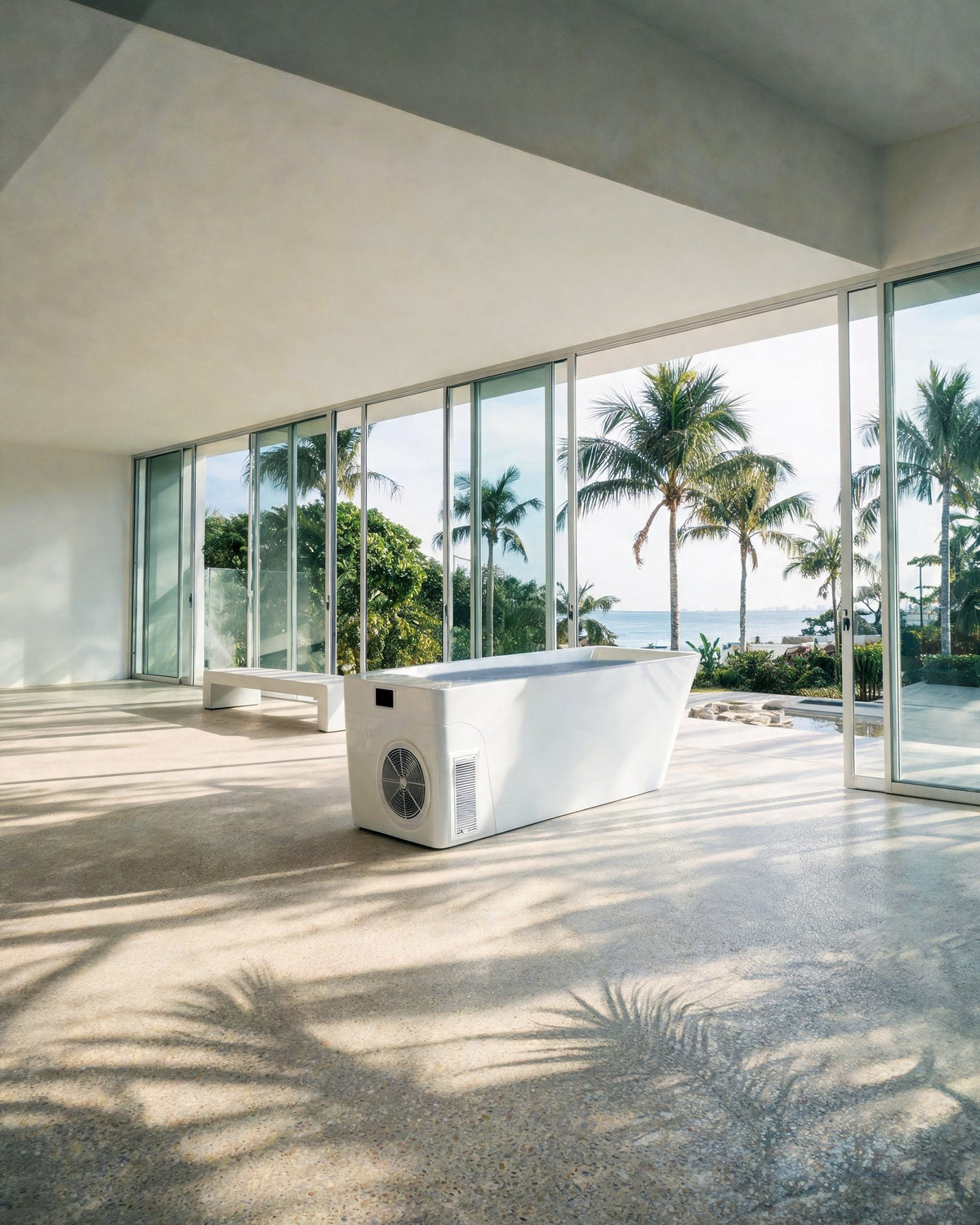 MONOLITH vessel on a terrazzo floor striped with palm shadows, glass walls onto a tropical garden