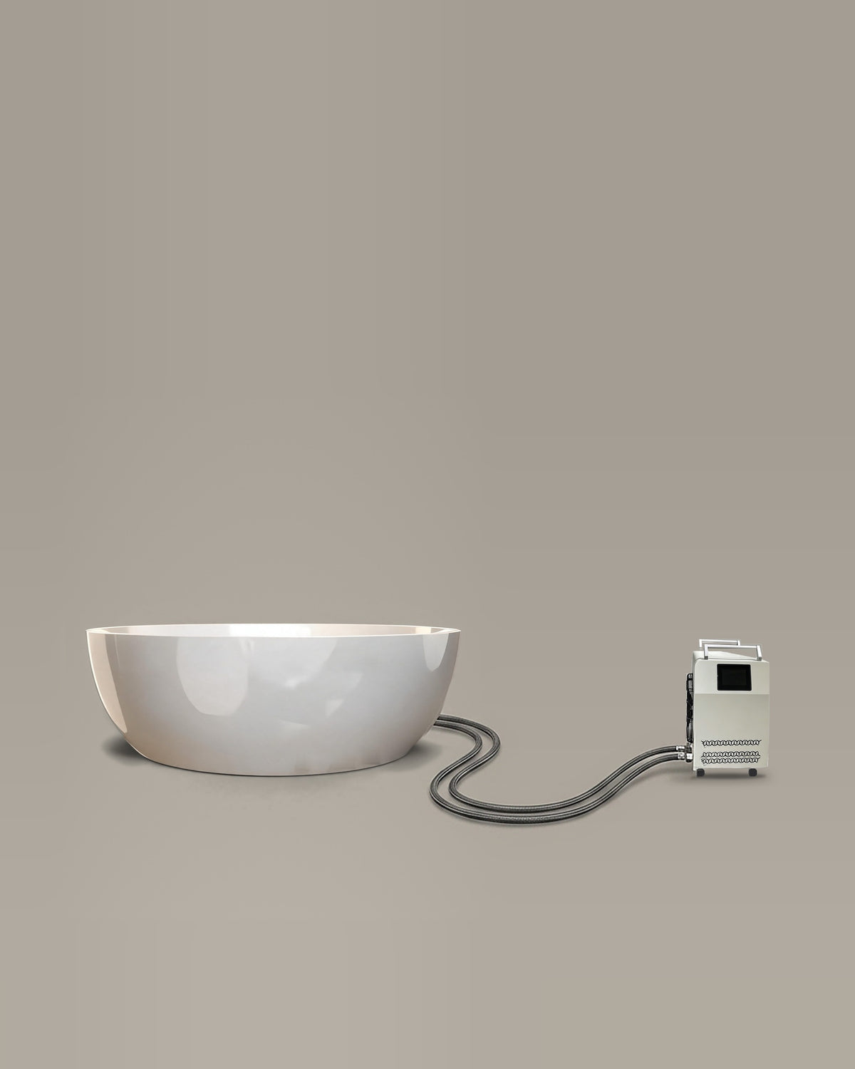 White round bathing vessel on a warm grey studio backdrop beside its Hot & Cold Unit, connected by two braided hoses