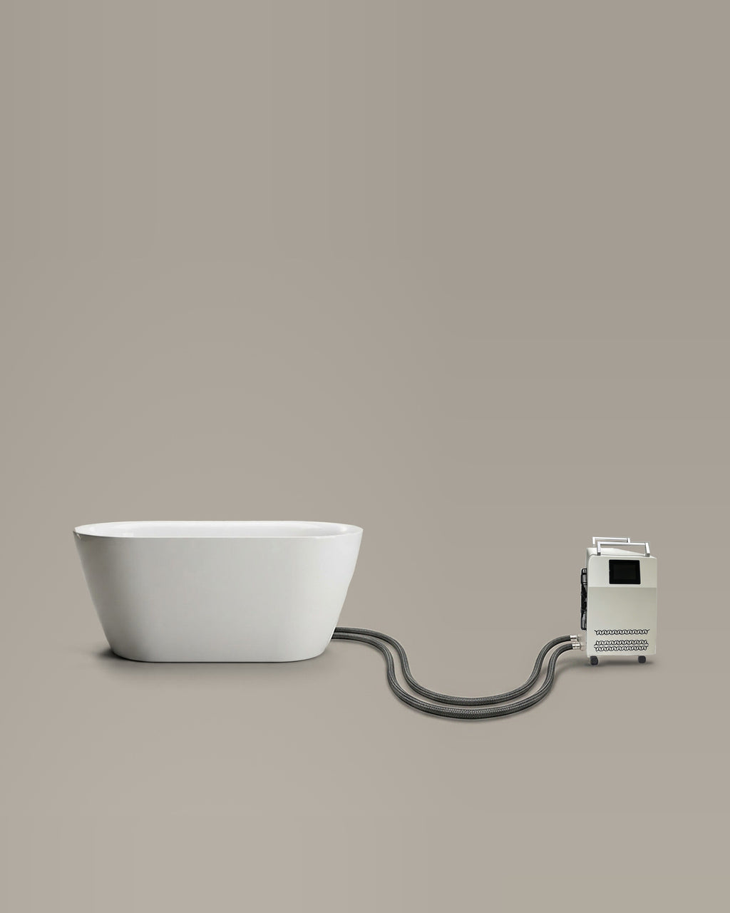 White freestanding bathing vessel on a warm grey studio backdrop beside its Hot & Cold Unit, connected by two braided hoses