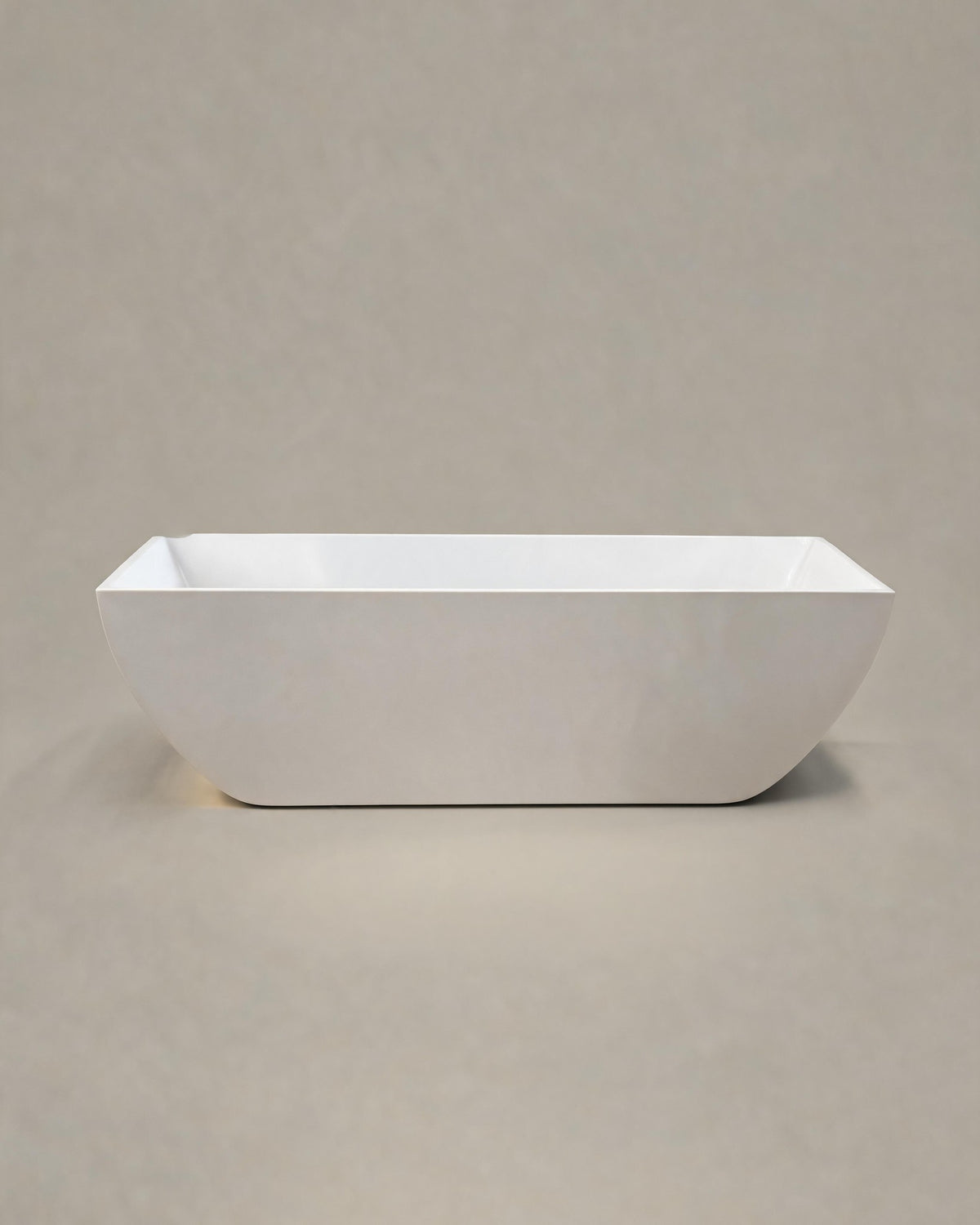 PRISM faceted vessel in white acrylic, side view on a warm grey studio background